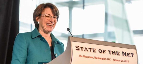 Amy Klobuchar giving the keynote address at the 2018 State of the Net Conference.