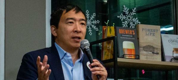  Andrew Yang speaking at a bookstore in Manchester, New Hampshire.